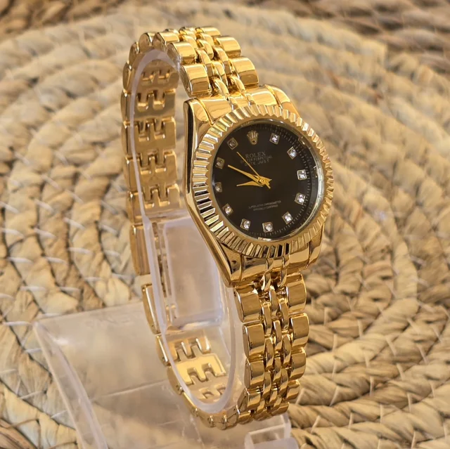 ساعت مچی زنانه صفحه گرد بند فلزی طلاییROLEX